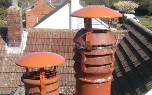 how to bird proof my chimney - two chimneys with cowls